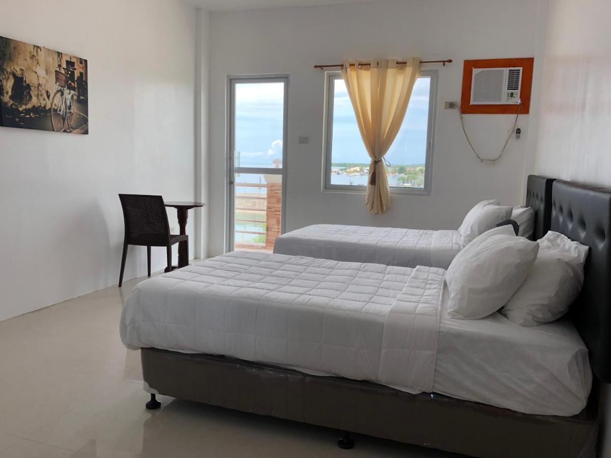 Arriyus Apartelle Daanbantayan Ngoại thất bức ảnh